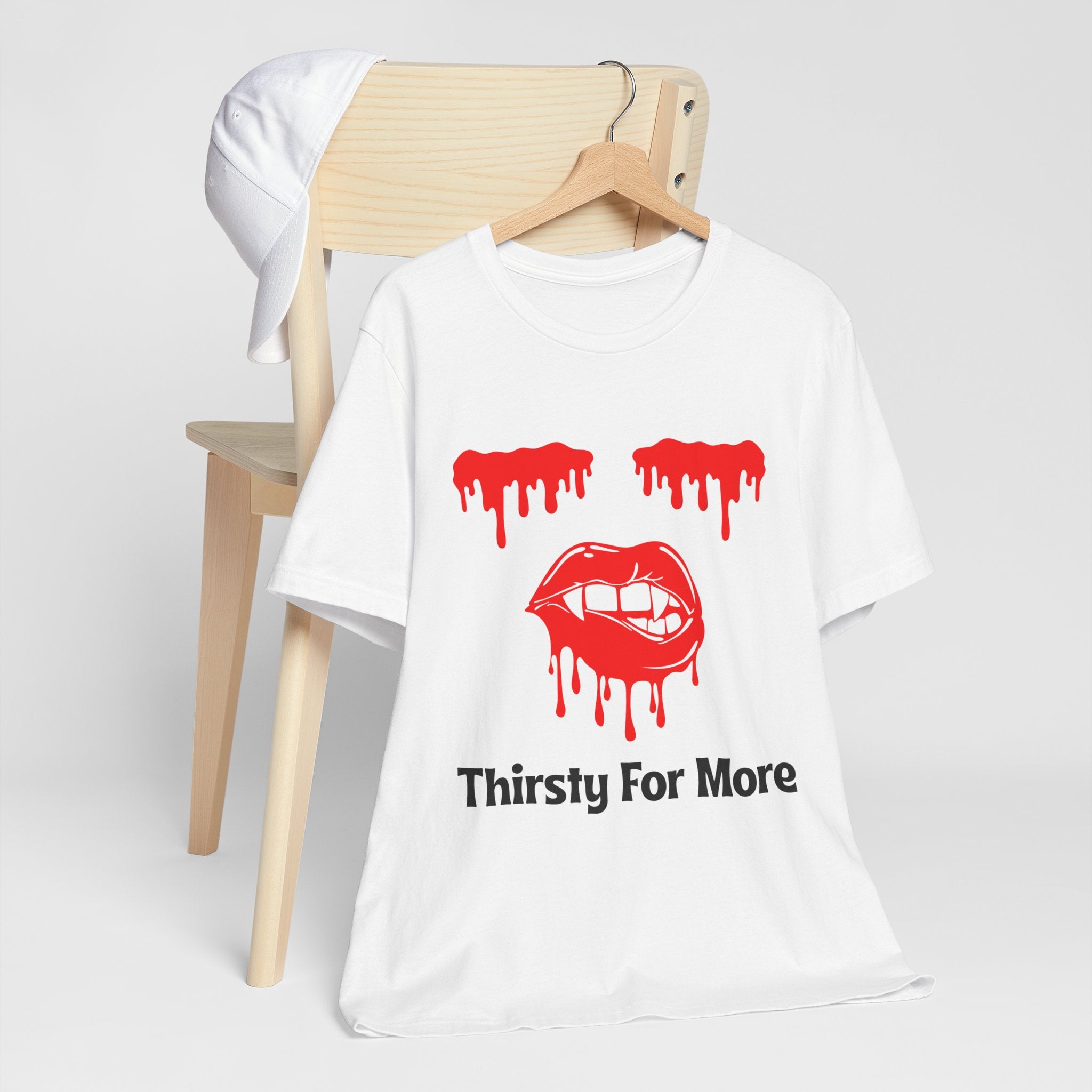 Thirsty For More – Vampire Bite Halloween T-Shirt, Fun T-Shirt, Casual Wear, Halloween Apparel, Unisex Short Sleeve Shirt, Gift for Friends